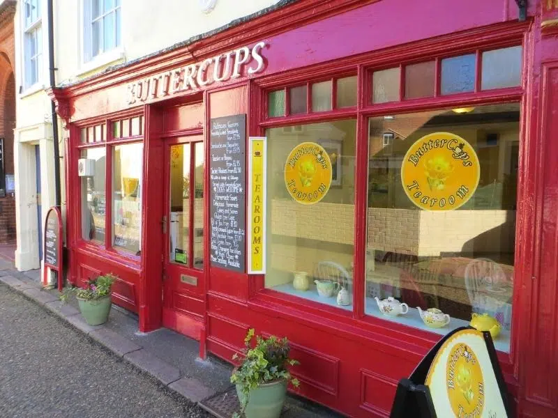 Red pained cafe frontage with large windows