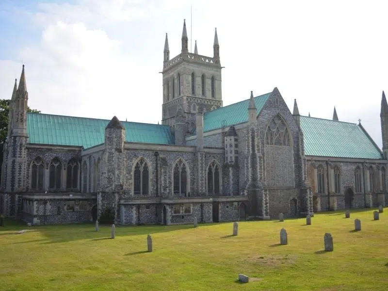 Large flint church with copper verdis gris roof