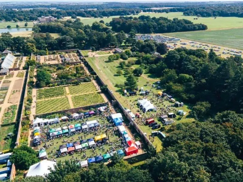aerial shot of walled garden with stalls