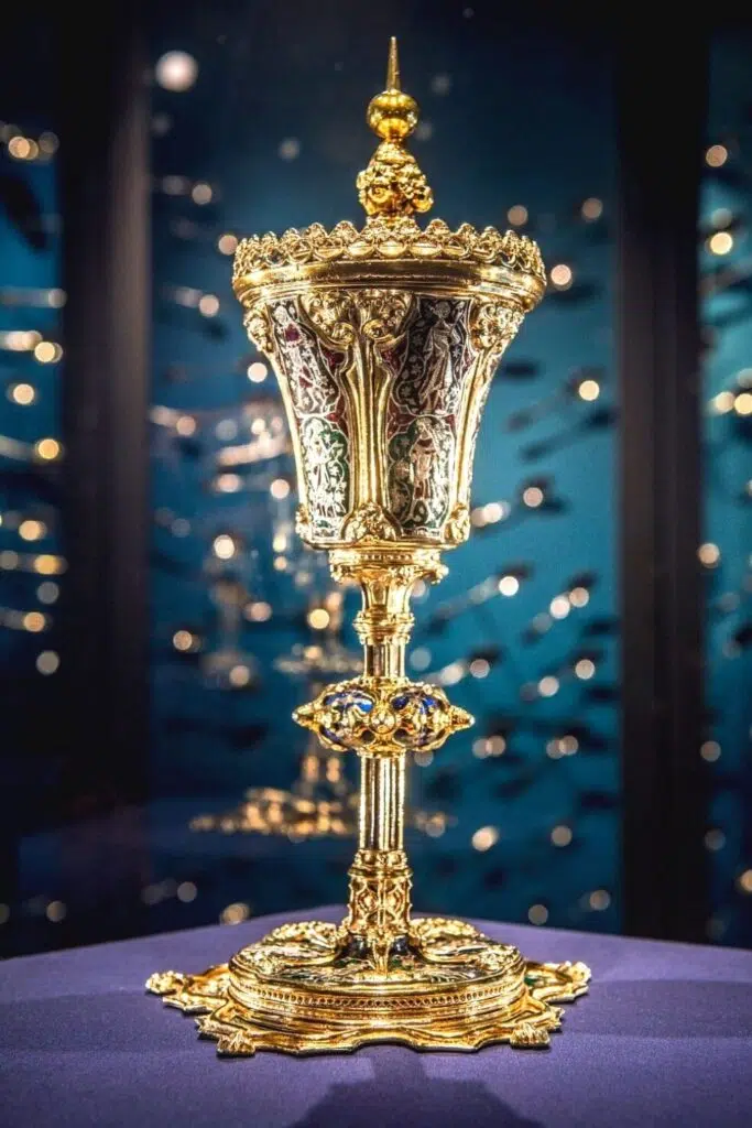 gold decorated chalice against a blue background