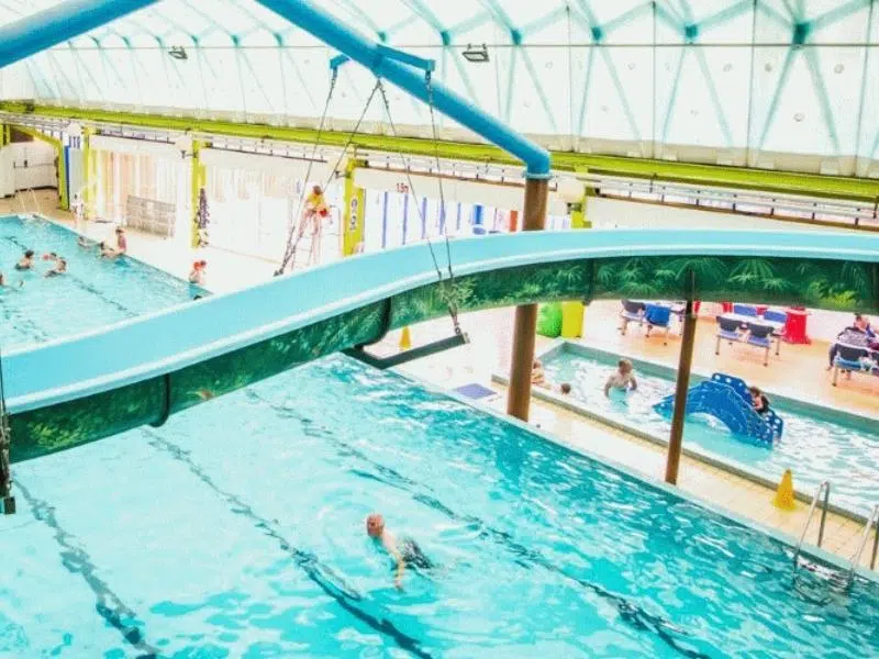indoor swimming pool with water slide