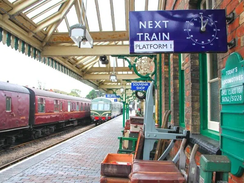 Steam strain in a red brick village station