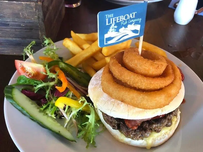 Burger with onion rings and frencg fries at the Lifeboat Pub Company