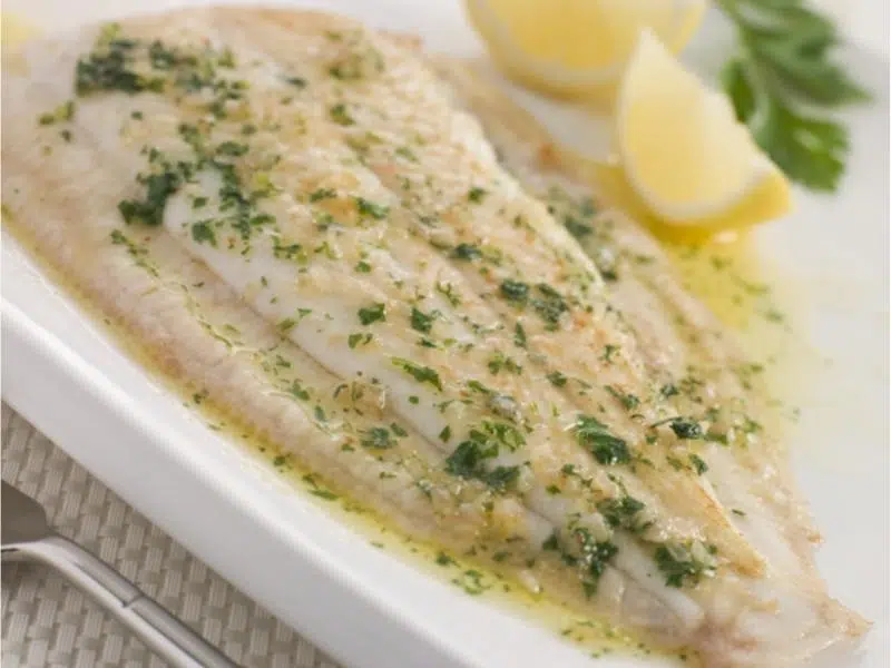 Cooked Lemon sole with butter and parsley