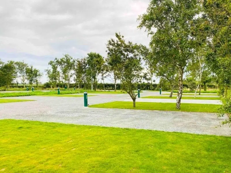 empty motorhome camping with hardstanding pitches and grass