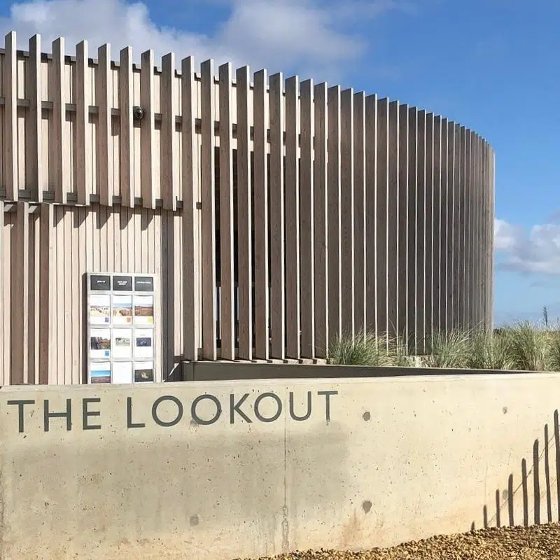The contemporary slatted wood design of The Lookout visitor centre at Holkham beach