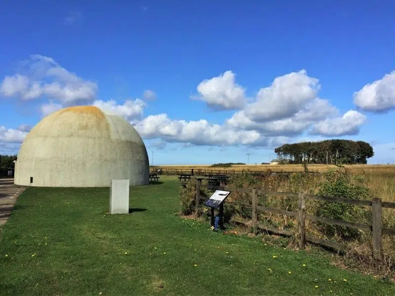 The dome at RAF Langham with a field of wheat behind