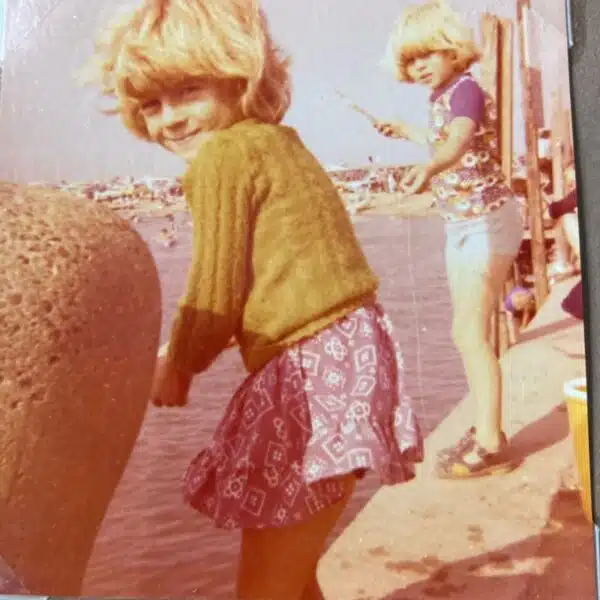 An image of two young girls crabbing in the quay