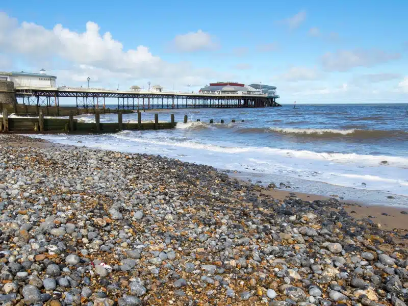 Cromer beach looking across the sea to Cromer Pier